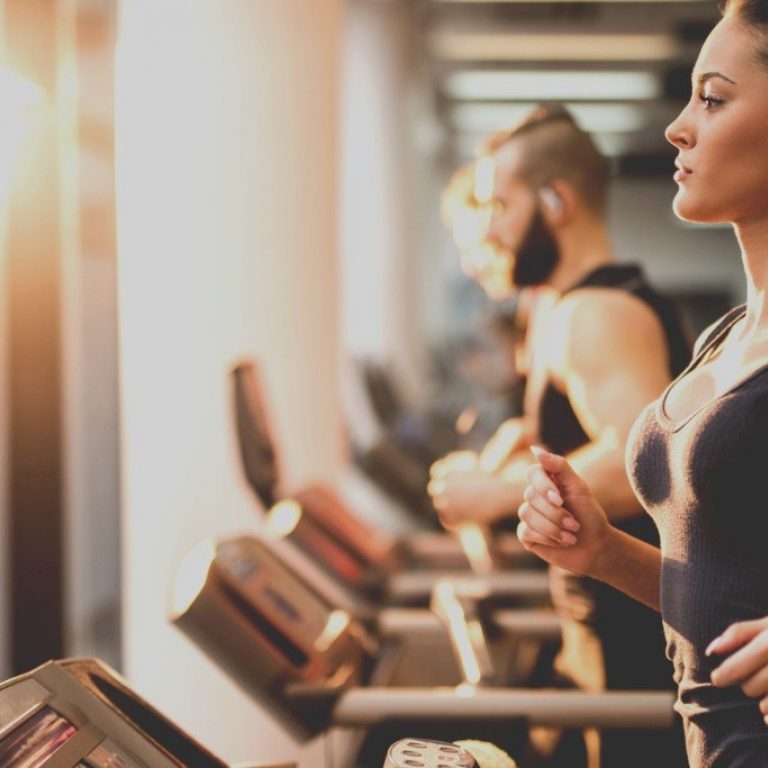 People Running On A Treadmill In Health Club Picture Id478859478