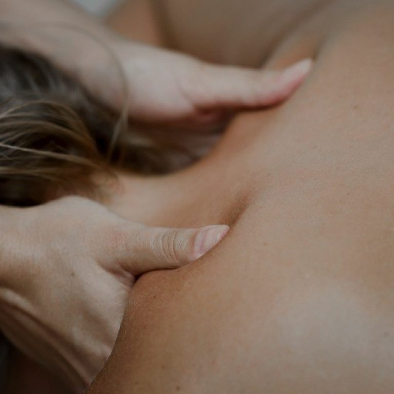 Young Woman Receiving A Back Massage In A Spa Center Picture Id854289292